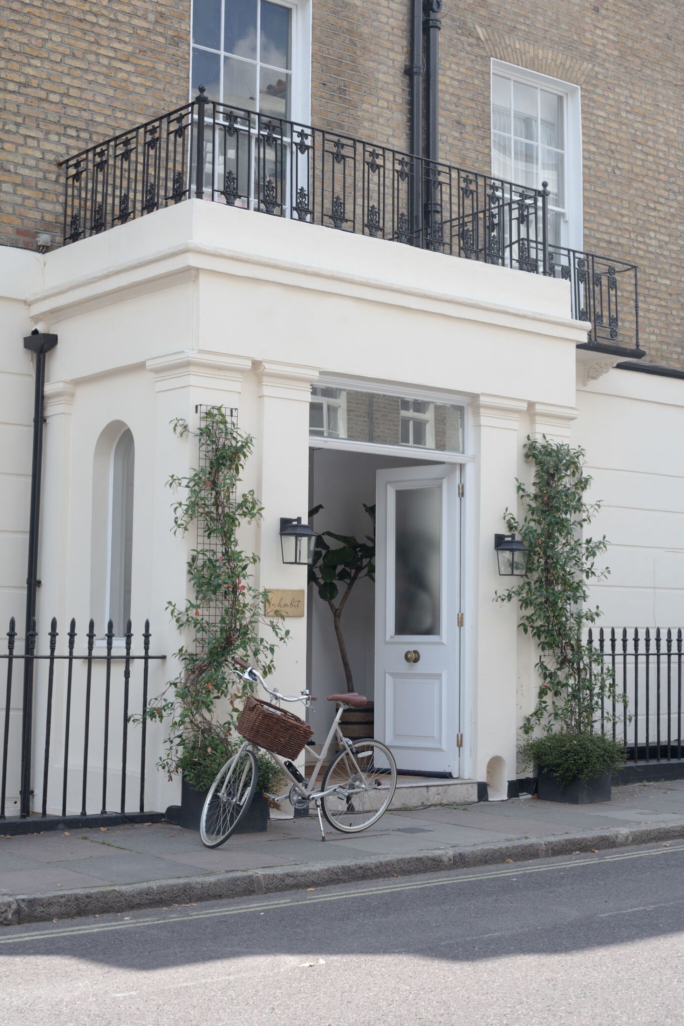 outside inhabit hotels with bike next to door