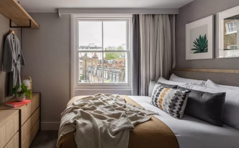 bedroom with bed and view out the window